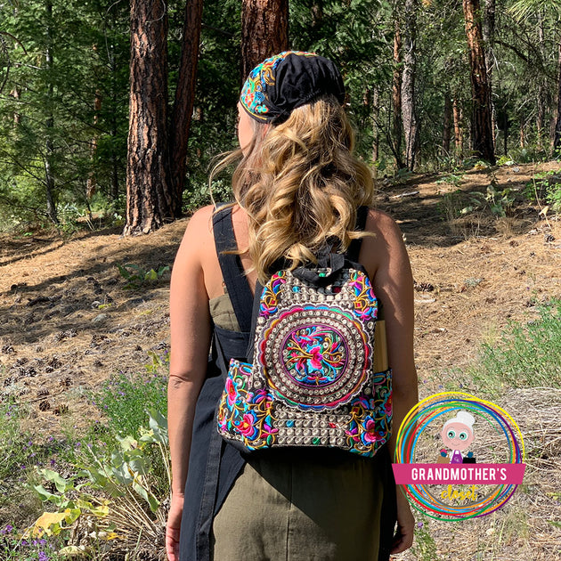 Embroidered discount backpack purse